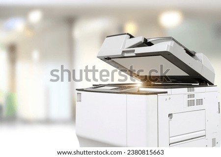 Copier or photocopier or photocopy machine office equipment workplace for scanner or scanning document or printer for printing paperwork hard copy paper duplicate copy or service maintenance repair. Royalty-Free Stock Photo #2380815663