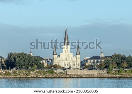 St. Louis Cathedral, is the seat of the Roman Catholic Archdiocese of New Orleans, seen from river Mississippi in early morning light, USA