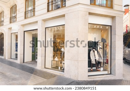 Fashion clothing storefront facade and windows mockup for your own branding