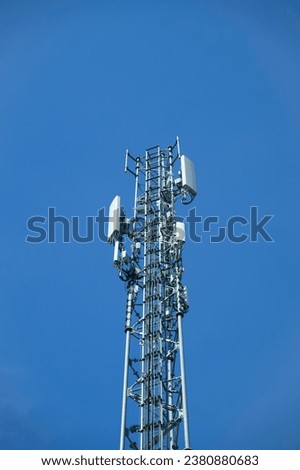 communication tower or 4G 5G network telephone cell site  on blue sky and space for text.