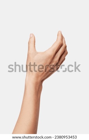 woman's hand holding something	
empty
