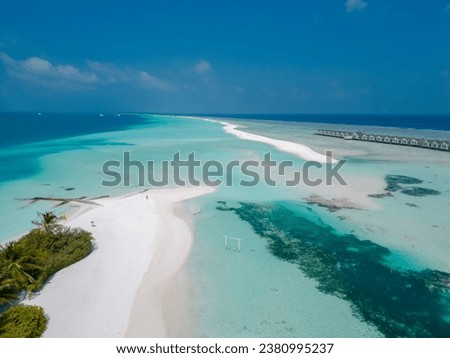
Dhigurah, Maldives Aerial View of Island Shore by Turquoise Sea Drone Photos