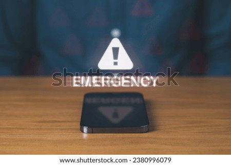 Urgent Emergency Alert Phone for Rapid Response. phone on the table with emergency and alert icon. Accident and Dial hotline 911 concept.