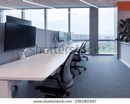 Interior of modern empty office building.Open white ceiling design,Cool tone.