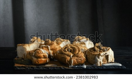 A Delicious cinnamon rolls assortment Royalty-Free Stock Photo #2381002983