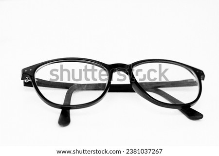 glasses on display on a table at an optician shop no people on white background stock image stock photo Royalty-Free Stock Photo #2381037267