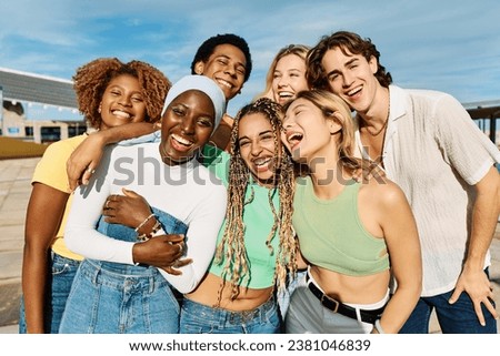 Happy group of friends with various ethnicities and religions Royalty-Free Stock Photo #2381046839