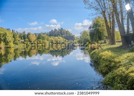 Beautiful views of the autumn river Berounka, forest and mountains, Czech. Royalty-Free Stock Photo #2381049999