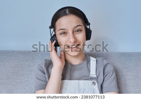 Webcam view of teenage girl student looking and talking to camera