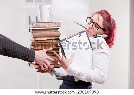 indifferent man overloading colleague woman with work Royalty-Free Stock Photo #238109398