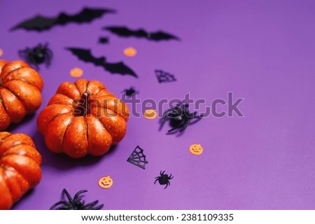 Happy Halloween banner mockup, pumpkins, bats and spiders on purple background