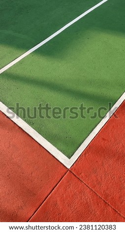 Close up of tennis court, high angle view of green court
