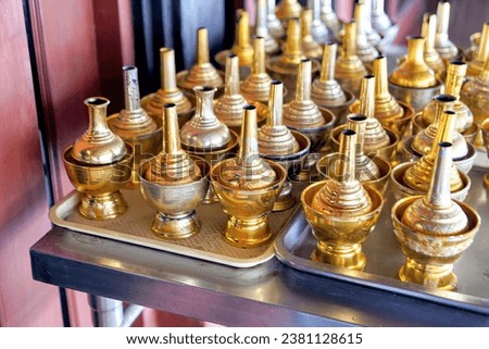 a tray of gold metal.