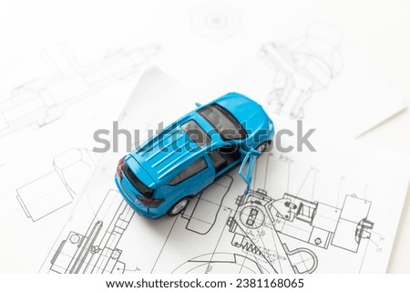 Finance commerce concept for car purchase loan or insurance. Image of blue car on white background. 