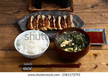 Gyoza, rice and wakame seaweed soup