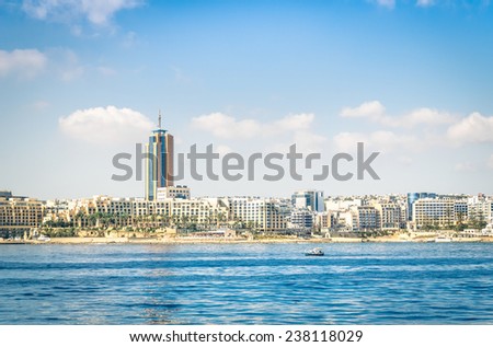 Skyline of Paceville at St Julians from the sea - Touristic nightlife place in the island of Malta near La Valletta - Mediterranean tourism travel destination