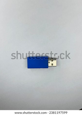 The USB flash disk is blue with a white background