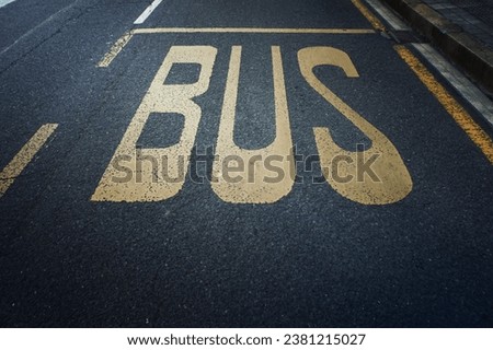 bus stop symbol on the road