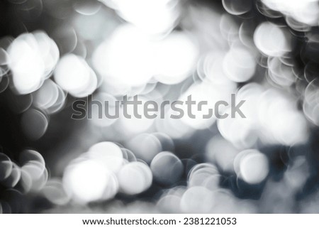 Christmas bokeh background light bokeh color .Photoshop technique Bokeh adding . bright shining in black and white . abstract background