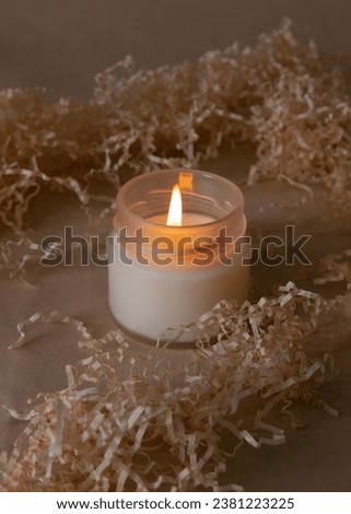 scented candle in a glass jar with a natural natural aroma