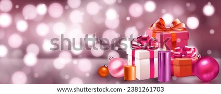 Holiday illustration with several colored gift boxes with ribbons and bows, burning candles and Christmas balls on a blurred background with bokeh effect in pink colors