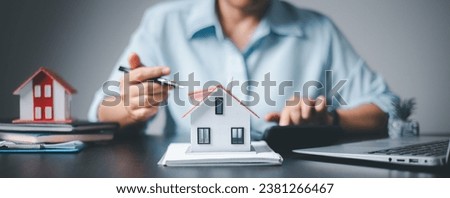 Real estate agent delivering sample homes to customers, mortgage loan contracts. Make a contract for hire purchase and sale of a house and home insurance contracts, home mortgage loan concepts