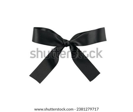 Black ribbon bow isolated on white background Royalty-Free Stock Photo #2381279717
