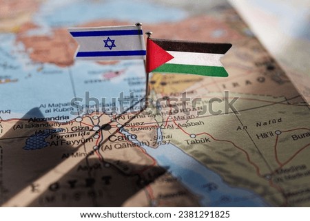 Jarusalem, Israel - 2023 October 14: Israel an Palestine flags on geopolitical Map. Gaza strip and West Bank. War conflict Royalty-Free Stock Photo #2381291825