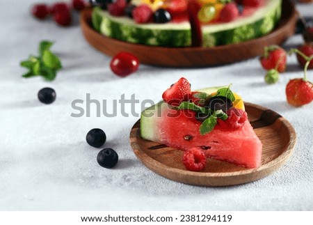 fruit pizza from watermelon with fresh berries