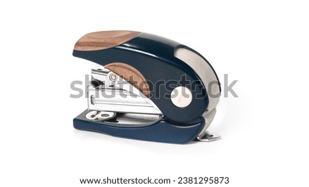 Blue handy stapler isolated on white background. High quality photo