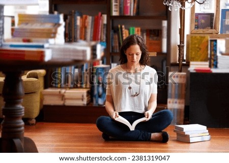 Woman, reading and floor in bookshop, library or relax for thinking for knowledge, information or literature. Girl, books and ideas for learning, education or studying on steps with research in store