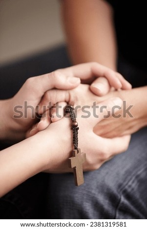 Helping hand, prayer together with beads and worship for religion, trust or spiritual hope. Support, counseling and people in Christian meeting for faith, praise or empathy with rosary, cross and God Royalty-Free Stock Photo #2381319581