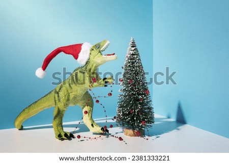 A dinosaur toy holding gift