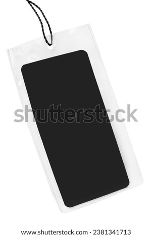 Blank plastic black clothes label isolated on white background
