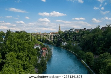 picture of Kornhausbrücke over the Aare river with the cathedral of Bern in the background