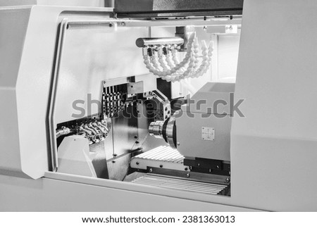 Metal machine tools industry. CNC turning machine high-speed cutting is operation.