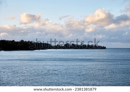 Beautiful view on the sea with clouds on the horizon, selective focus. High quality photo