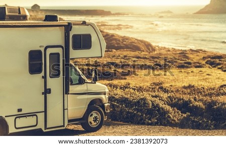 Class C Motorhome Camper Van in Front of Cambria California Pacific Ocean Royalty-Free Stock Photo #2381392073