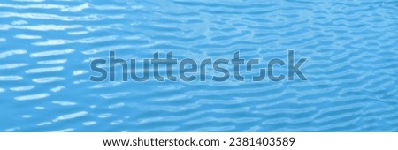 Light reflection Beautiful wave pattern on the ocean surface. Blue background