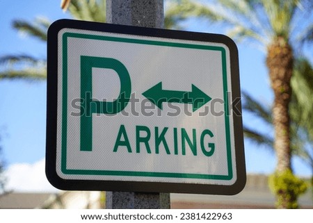 Parking Area With Bidirectional Arrow Sign.                 