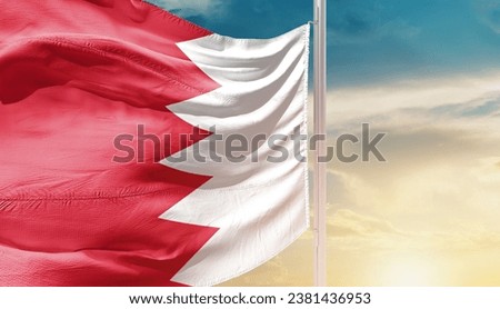 Bahrain national flag waving in beautiful sky. The flag waving with dynamic angle.