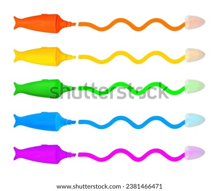 Five multicolored fish shaped magic markers drawing wavy lines, isolated