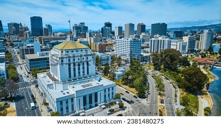 Alameda County Superior Courthouse aerial with view of Oakland city Royalty-Free Stock Photo #2381480275