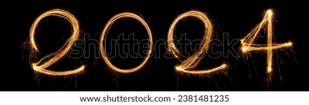 Happy New Year 2024. Sparkling burning Fireworks numbers 2024 isolated on black background. Beautiful Glowing golden. Alphabet of Sparklers texture for happy design  Royalty-Free Stock Photo #2381481235