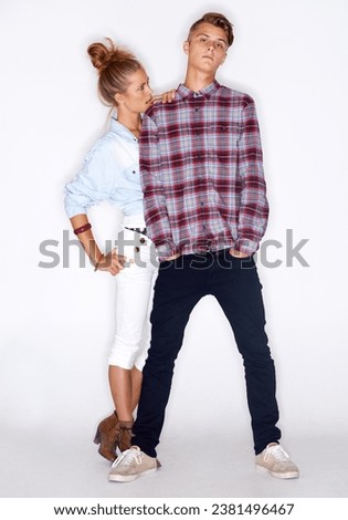 Fashion, couple and clothes with style and people, trendy and stylish isolated on white background. Young, serious man and woman model in a studio with casual clothing, beauty and pose together