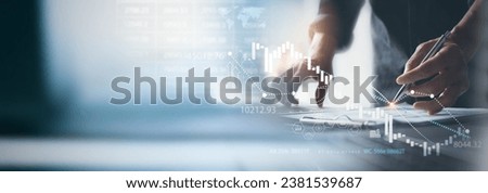 Banking business, finance and investment concept. Businessman analyzing market data, financial graph report, economic growth, business strategy, planning and solution, risk management Royalty-Free Stock Photo #2381539687