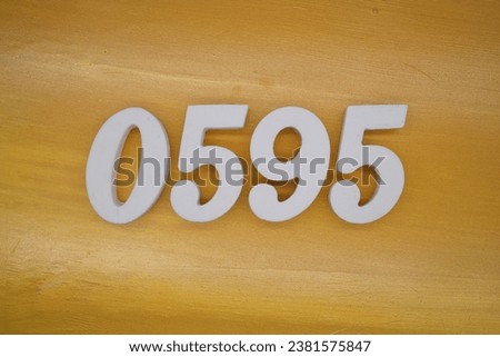 The golden yellow painted wood panel for the background, number 0595, is made from white painted wood.