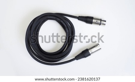 The XLR Jack connector is used to connect the mic to a mixer or other equipment. XLR Jack connector isolated on white background