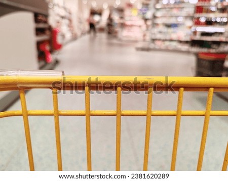 Cart in supermarket - shopping concept