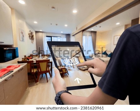 Virtual tour 360 for real estate technology concept.Man hands holding digital tablet Royalty-Free Stock Photo #2381620961